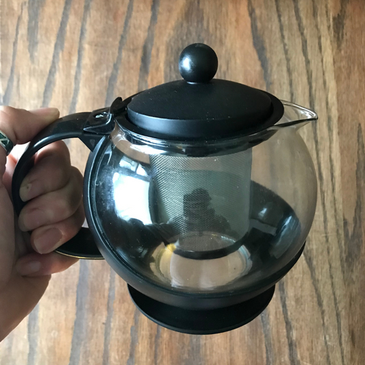 Glass tea pot with black base.  160z with  mesh steeper basket and lid 